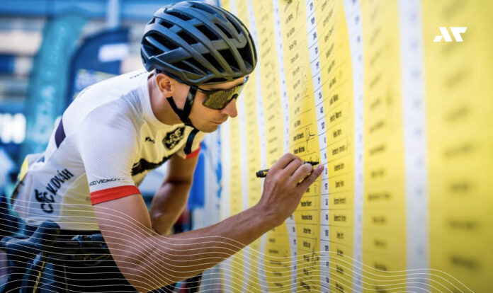 Zawodnik zapisujący się na ścianie L'Étape by Tour de France