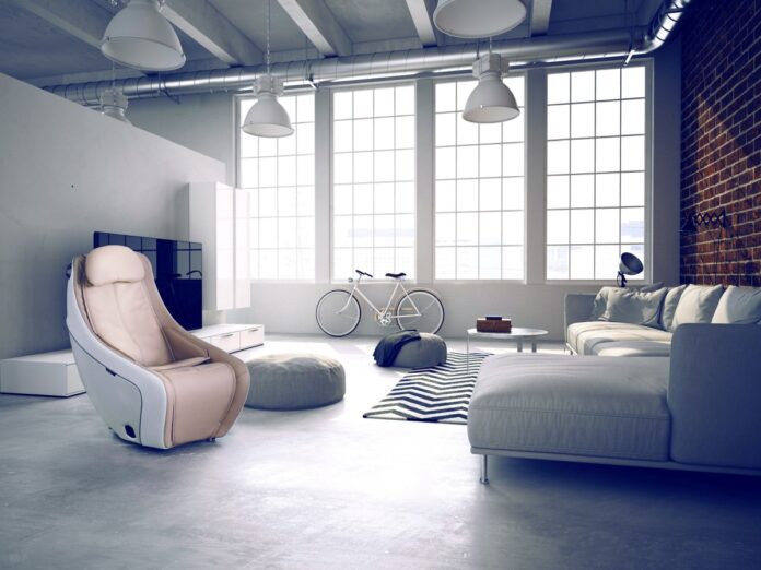 Fotel masujący Synca w nowoczesnym salonie – regeneracja po treningu