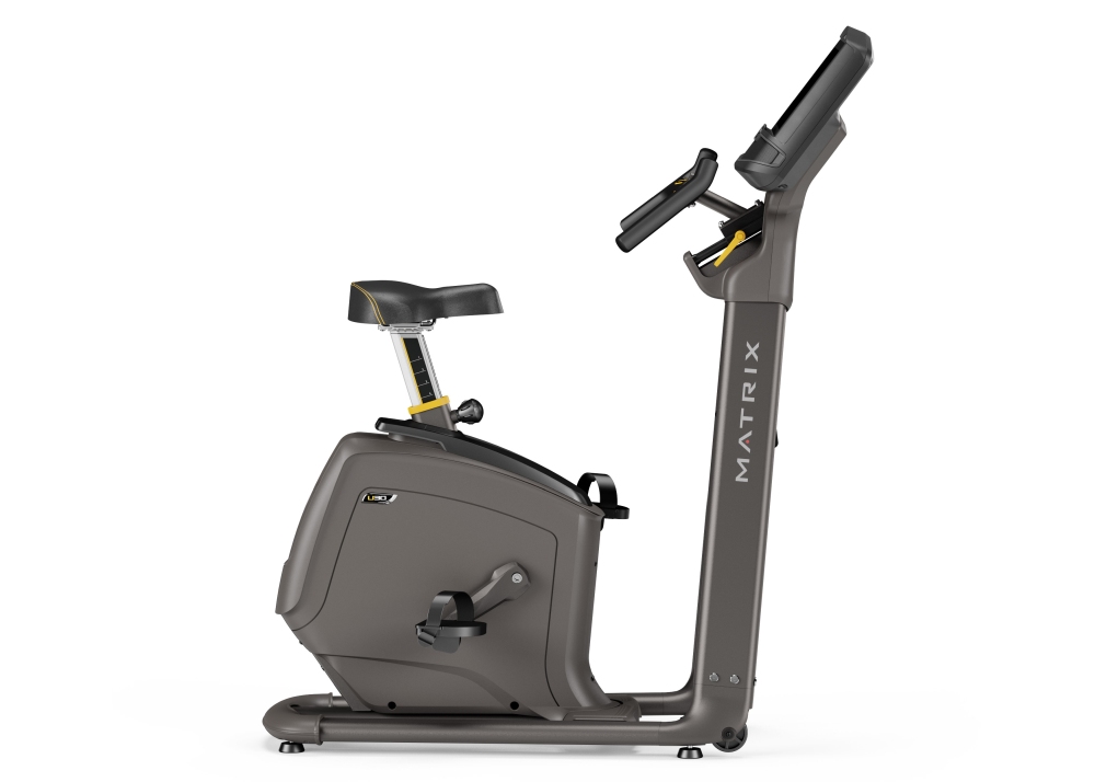 Rower pionowy Matrix U30 – widok boczny, kompaktowa konstrukcja do domu